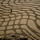 Illustration for article titled Watch What This Man Creates with Some Sand and a Rake